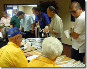 Members of the Oklahoma Shelter Team test the wristband check-in system during the recent exercise of the Shelter in a Box program in Shreveport, Louisiana.